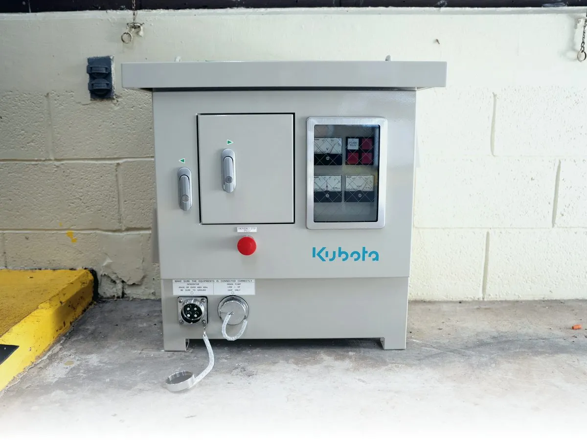 Kubota Handy Mobile Pump Unit (mini) staged on a warehouse floor — pump head, control panel, and accessories